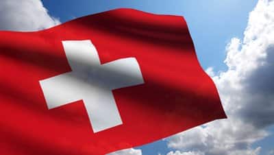 stock footage switzerland flag animation with real time lapse clouds Swiss Day - Bonfol et Porrentruy